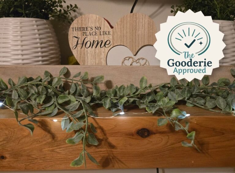 Rechargeable Fairy Light Review: rechargeable fairy lights on a wooden shelf with greenery
