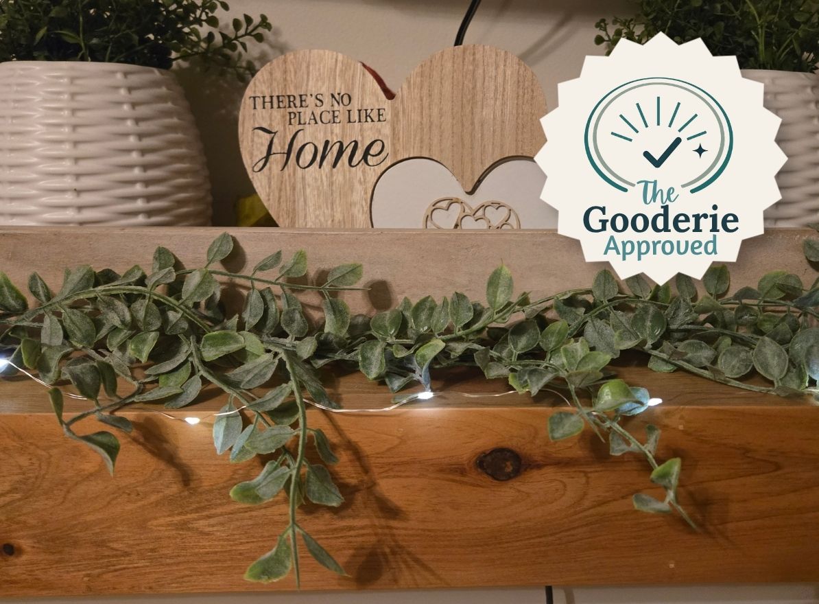 Rechargeable Fairy Light Review: rechargeable fairy lights on a wooden shelf with greenery